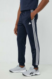 Adidas pantaloni de trening bărbați, culoarea bleumarin, cu imprimeu H46106