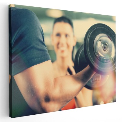 Tablou barbat facand exercitii cu gantera Tablou canvas pe panza CU RAMA 80x120 cm foto