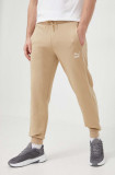 Puma pantaloni de trening T7 culoarea bej, uni 624329