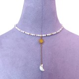 Colier auriu la baza gatului din piatra lunii cu pandantiv soare si luna din sidef