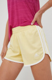 Cumpara ieftin Adidas Performance pantaloni scurți de alergare Marathon 20 femei, culoarea galben, cu imprimeu, medium waist