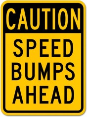Caution Speed Bumps Ahead Sign foto