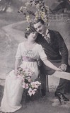 Scena galanta cu indragostiti intr-o gradina simulata (circulata 1927)