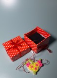 Martisor lucrat manual - pasare cu floricele roze si galbene - din clei, Unicat