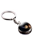 Cumpara ieftin Breloc fosforescent cu planeta Saturn, metal si sticla, efect luminos in intuneric, pandantiv pentru chei, geanta si rucsac, argintiu