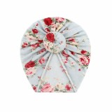 Caciulita bleu cu imprimeu inflorat tip turban (Marime Disponibila: 3-6 luni)