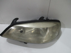 Far stanga Opel Astra G An 1999-2007 cod 90520879 foto