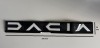 Emblema DACIA alb plastic, 370mm x 36mm, prindere banda dublu adeziva, piese auto caroserie
