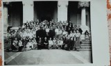 Fotografie tip carte postala, ansamblul popular in fata bisericii, perioada interbelica
