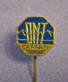 Insigna - &bdquo;ONT Carpați&rdquo; (Oficiul Național de Turism), emblemă octogonală cu ac, emailată, din perioada comunistă (RSR)