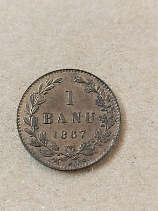 1 Banu 1867 - H . Patina originala, luciu de batere. UNC . Rara in aceasta stare