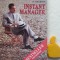 Instant manager Cy Charney