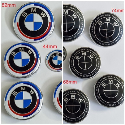 Set BMW 7 buc embleme capota portbagaj volan capace jante doua modele |  Okazii.ro