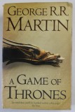 A GAME OF THRONES , by GEORGE R.R. MARTIN , BOOK ONE OF '' A SONG OF ICE AND FIRE '' , 2011