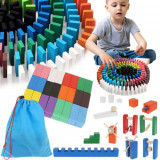 Set Domino din Lemn pentru Copii, 407 Piese, &icirc;n Geantă de P&acirc;nză, 43x29 cm, Multicolor, Kruzzel