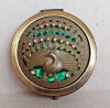 Pudriera interbelica din alama, model vintage indian, paun cu pietre colorate