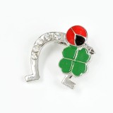 Brosa martisor potcoava argintie cu trifoi