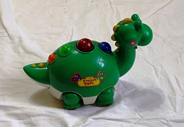 dinosaur dinosaur de jucarie din plastic vechi vintage cu 3 baterii