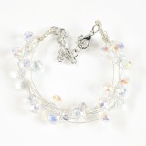 Bratara cu margele transparente si sclipiri irizate