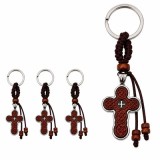 Cumpara ieftin Set 4 brelocuri crestine maro-argintiu 9.5 cm, cruci decorative 4 cm cu fata gravata si spate metalic, margele din lemn, snur textil impletit, inele 2