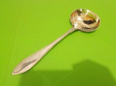 STRECURATOR argintat cu maner , marcat , strecuratoare foto