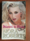 Nascuta in flacari, Nora Roberts