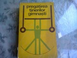 PREGATIREA TINERILOR GIMNASTI