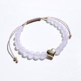 Bratara reglabila din cuart roz cu pandantiv inima auriu si accesorii metalice din otel inoxidabil