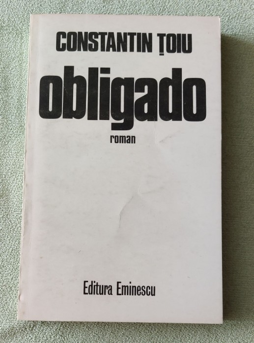 Constantin Țoiu - Obligado