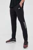 Adidas Performance pantaloni de alergare Own the Run culoarea negru, cu imprimeu HN0806