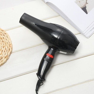 Uscator de par multifunctional, putere 1800 W, cu doua trepte de viteza si temperatura, ergonomic si usor, compact si pliabil, negru foto