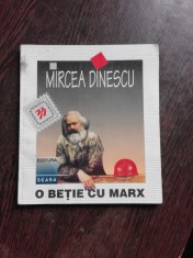 O BETIE CU MARX - MIRCEA DINESCU foto