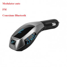 Car Kit auto cu functie de modulator FM ,Bluetooth
