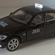 Macheta BMW 330i (E90) 2009 Taxi Stockolm - Welly 1/36