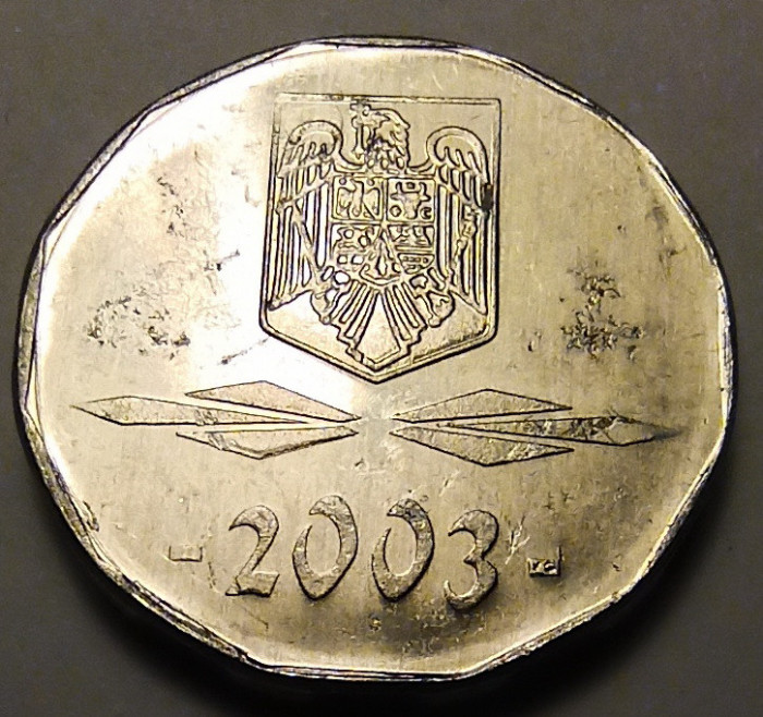Moneda 5000 lei 2003 (#3), luciu de batere partial