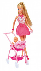 Papusa Steffi in rochita roz si cu carucior bebe foto