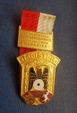 G998-I- MEISTER-Medalia Tir- Tragatori la tinta Hanovra Germania 1955 alama aurita stare foarte buna cu panglica originala. Marimi: 5/ 4 cm.