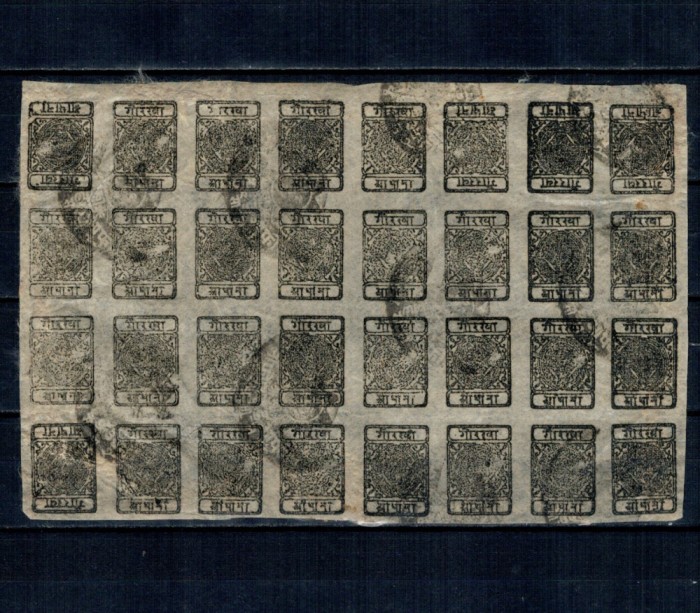 Nepal 1899 - 1/2 anna, bloc de 32 marci stampilate, cu tete-beche