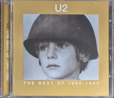 cd u2 the best of 1980-1990 foto