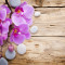 Fototapet de perete autoadeziv si lavabil Orhidee roz cu pietre, 300 x 200 cm