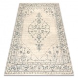 Covor de lana ABBY 486.10.LA100 OSTA Ornament, cadru, clasic bej / verde, 135x200 cm