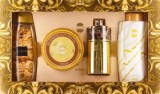 Cumpara ieftin Set cadou Ajmal Aurum (Apa de parfum 75 ml + Unt de corp 200 g + Gel de dus 200 ml + Pudra parfumata 100 g), pentru femei