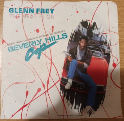 Disc Vinil 7# Glenn Frey - The Heat Is On -MCA Records-259 179-7 foto