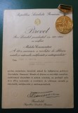 ROMANIA - MEDALIA &bdquo;A 40 -A ANIVERSARE A REVOLUTIEI DE ELIBERARE SOCIALA SI NATIONALA, ANTIFASCISTA SI ANTIIMPERIALISTA&rdquo; CU BREVET SEMNAT N. CEAUSESCU