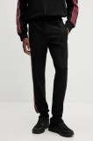 adidas Originals pantaloni de trening Manchester United culoarea negru, cu imprimeu, JF0359