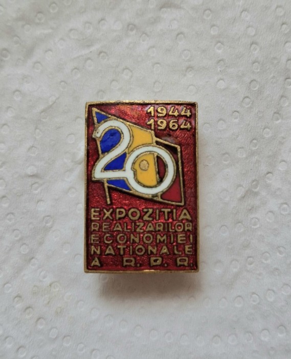 Insigna Expozitia Realizarilor Economiei Nationale a R.P.R. 1944&ndash;1964