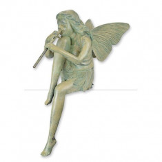 Zana sezand cu un fluier-statueta din bronz TBD-23