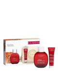 Cumpara ieftin Set cadou Clarins Eau Dynamisante (Apa de toaleta 100 ml + Gel de dus 30 ml + Geanta cosmetice), pentru femei