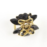 Cleste auriu cu pietre acrilice negre