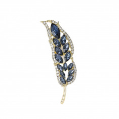 Brosa Joslyn, albastra, cu montura aurie, in forma de frunza, decorata cu pietre - Colectia Celebration